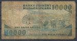 Мадагаскар 1983-1997 гг. • P# 70b • 10000 франков(2000 ариари) • девочка • регулярный выпуск • VG