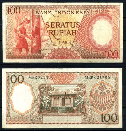 Индонезия 1958 г. P# 59 • 100 рупий • сбор каучуковой смолы • регулярный выпуск • UNC* пресс