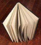 Альбом для марок A4 • 8 листов(16 страниц) фон белый • США • б.у. UNC-