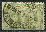 Родезия 1910-1913 гг. • Gb# 121 • ½ d. • "Две головы" • перф. - 14 (оливково-зелёная) • Used XF ( кат.- £6 )