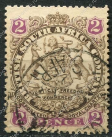 Родезия 1896-1897 гг. • Gb# 30 • 2 d. • 1-й выпуск (с точкой у хвоста) • герб колонии • Used XF ( кат.- £ 3 )