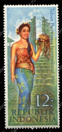 Индонезия 1967 г. • Mi# 584 • 12 r. • Год туризма • девушка на фоне храма • MNH OG XF