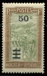 Мадагаскар 1932 г. • Iv# 189 • 50 c. на 1 fr. • осн. выпуск • путешественник в кресле-носилках • надпечатка нов. номинала • MNH OG* F-VF