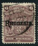 Родезия 1909-1912 гг. • Gb# 106c • 6 d. • герб колонии • надпечатка • "Rhodesia" • серо-лиловая • стандарт • Used VF ( кат.- £ 13 )